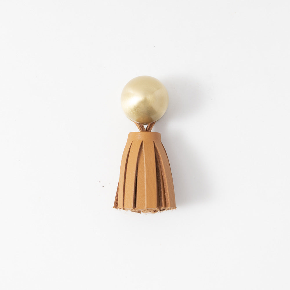 Ins brass tassel handle