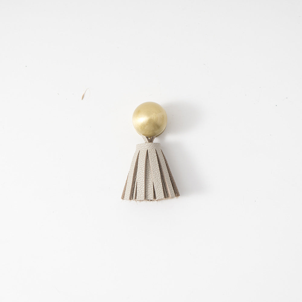 Ins brass tassel handle