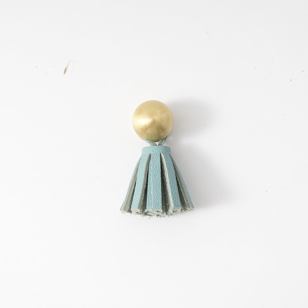 Ins brass tassel handle