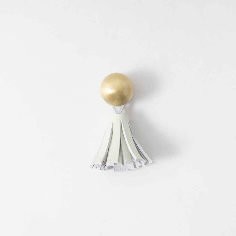 Ins brass tassel handle