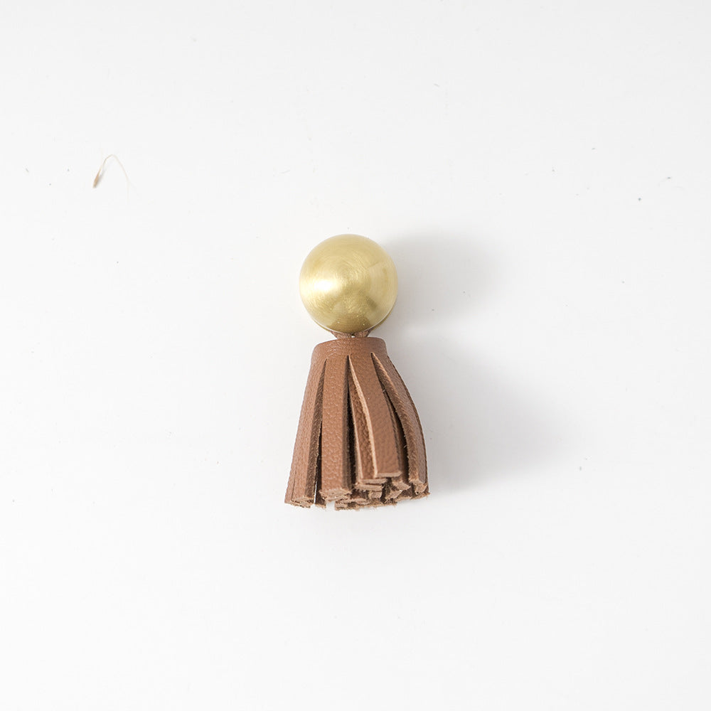 Ins brass tassel handle