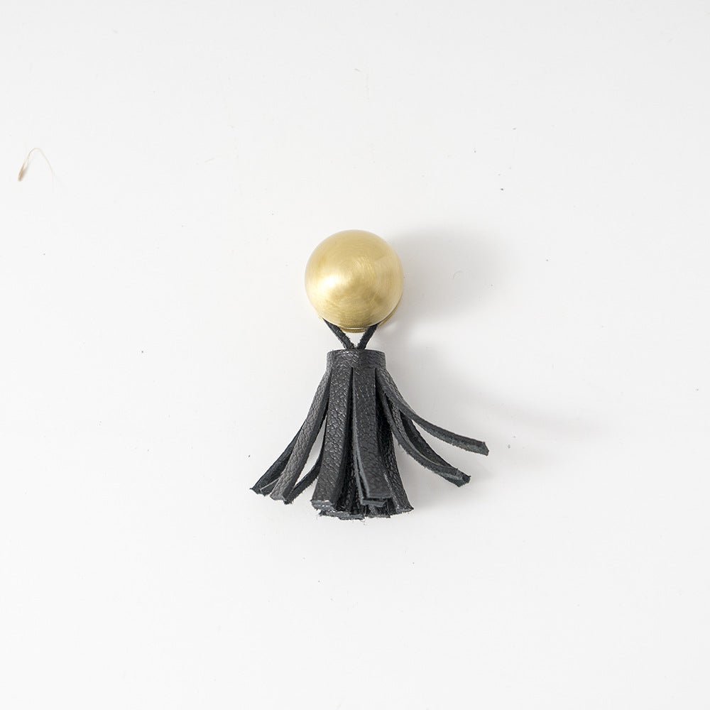 Ins brass tassel handle