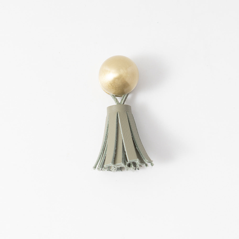 Ins brass tassel handle