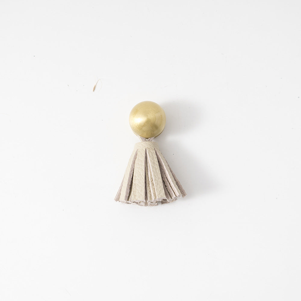 Ins brass tassel handle