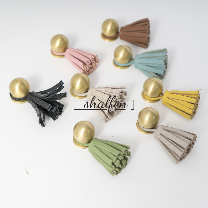 Ins brass tassel handle