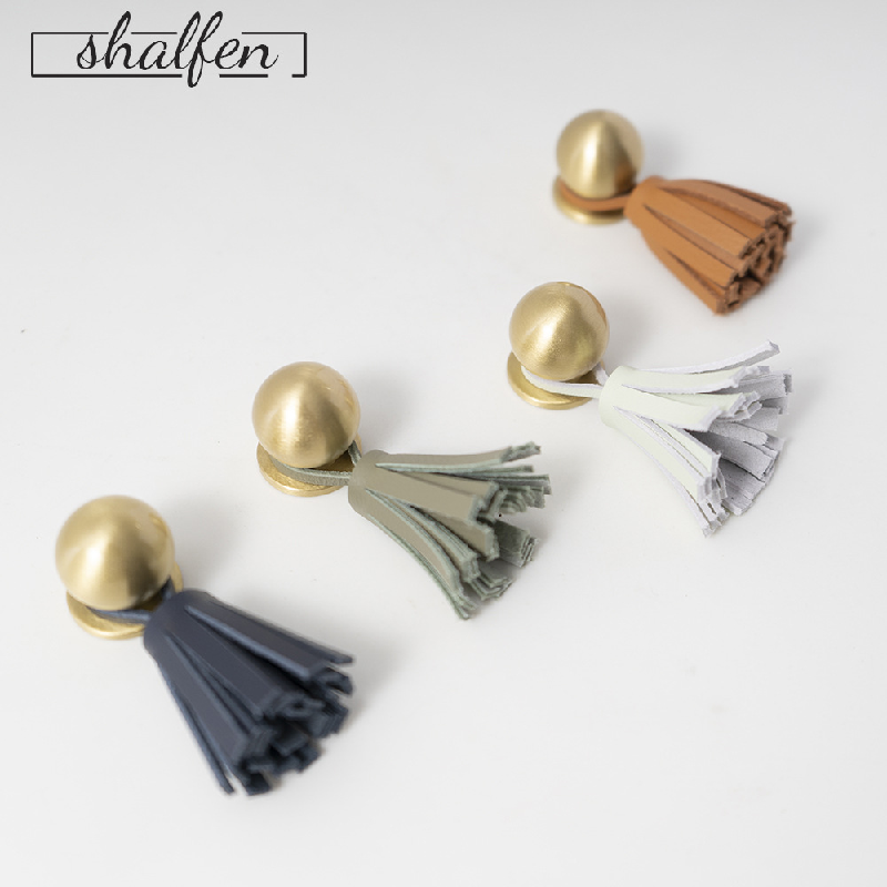 Ins brass tassel handle